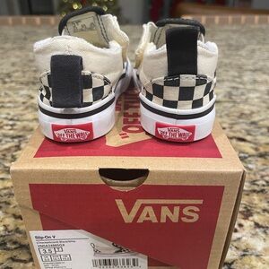 Vans checkered slip ons